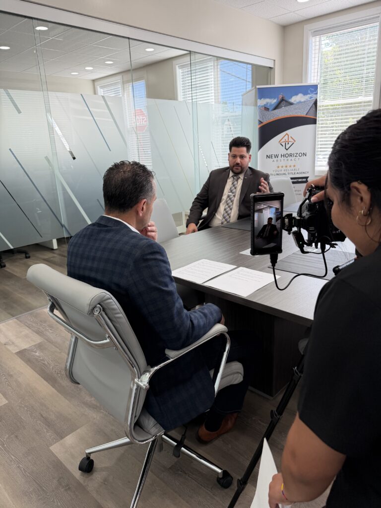Maze filming a client meeting at the conference table